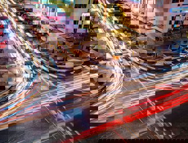 A long exposure of traffic lights at a cross roads.