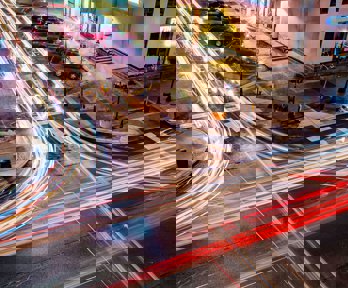 A long exposure of traffic lights at a cross roads.