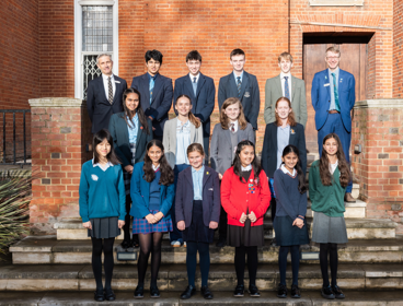 Group of 14 school students standing on Society's Terrace steps
