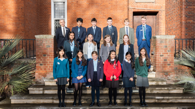 Group of 14 school students standing on Society's Terrace steps