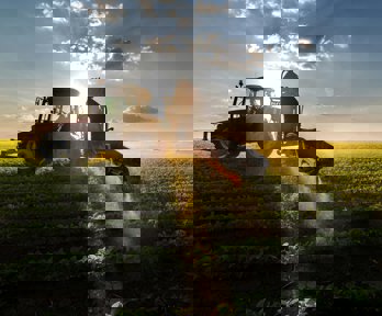 A tractor ploughing a field