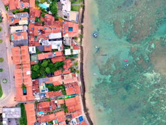 A coastal town and a beach. The village of Morro de São Paulo in Bahia, Brazil.