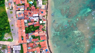 A coastal town and a beach. The village of Morro de São Paulo in Bahia, Brazil.