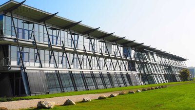 Cambridge Science Park building showing glass windows and modern building design.