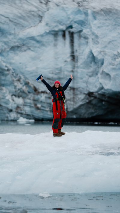 Sally Earthrowl standing by a glacier