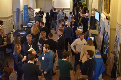 GeoCom attendees networking in the Society's Main Hall 
