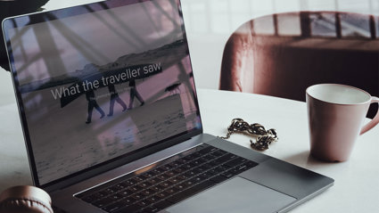 Laptop displaying an RGS online exhibition called 'What the traveller saw'.