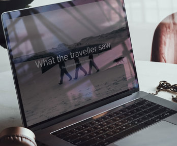 Laptop displaying an RGS online exhibition called 'What the traveller saw'.