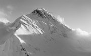 Old black and white photograph of Mount Everest.
