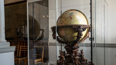 Full view of AK Johnston globe in a display cabinet in the Map Room of the Royal Geographical Society. 