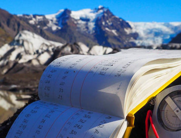 A journal listing measurements taken on a mountain.