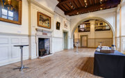 A grand main hall set-up with a tea and coffee station for a refreshment break. 