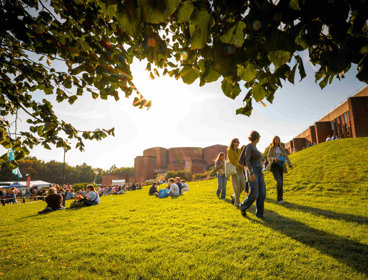 University of Sussex campus showing buildings and students