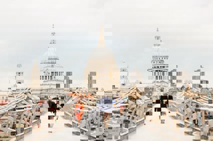 A view down a bridge to St Paul's Cathedral in London