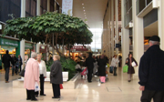People standing in shopping centre.
