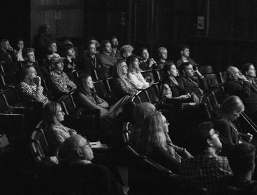 Captivated audience members watch a film screening in the Ondaatje Lecture Theatre.
