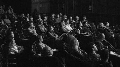 Captivated audience members watch a film screening in the Ondaatje Lecture Theatre.