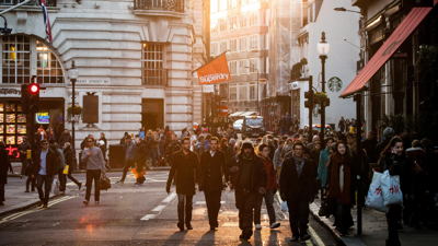 People walking down a busy street