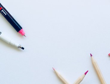 Scattered pens, pencils and pegs