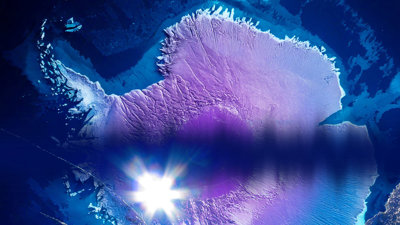 Colourful aerial view of Antarctica as seen from above.