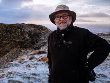 Cormac Hamill standing on Cave Hill. 