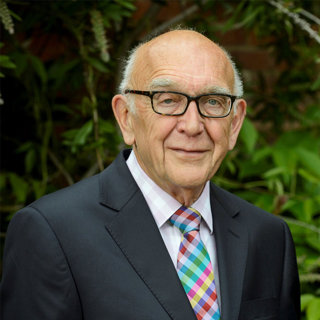 Ken Gregory in suit and tie.