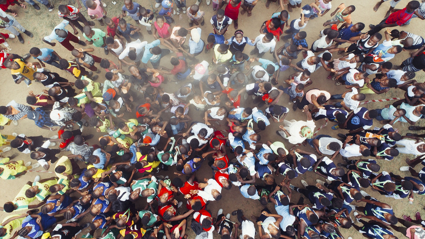 A birds eye view of a crowd of school students