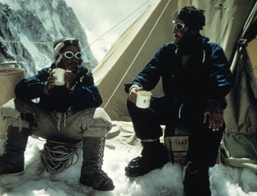 Tenzing Norgay and Edmund Hillary drink tea in the Western Cwm