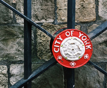 City of York sign in front of brick wall
