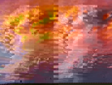 Orange and purple tinted clouds on a stormy day