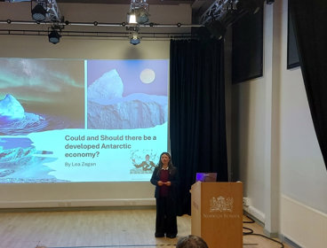 Speaker on stage Norwich School.