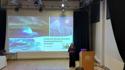 Speaker on stage Norwich School.