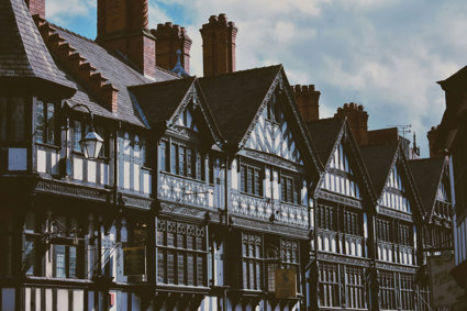 Black and white tudor style buildings on a street