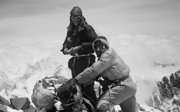Old black and white photograph of Tenzing Norgay and Edmund Hillary on Everest.