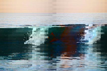 Man surfing on an ocean wave