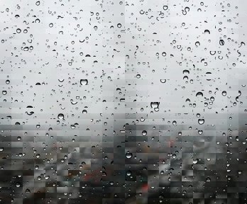 Raindrops on a clear window