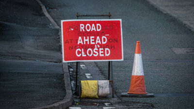 Road ahead closed sign.