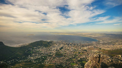 Aerial view of Cape Town, South Africa under a blue sky.