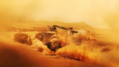 Truck on sand dune.