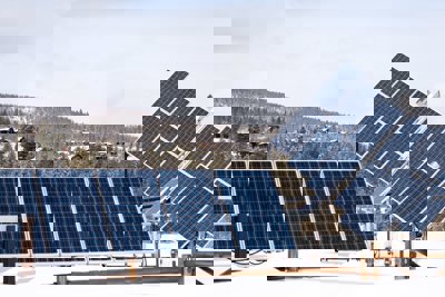 Solar panels sitting on a roof