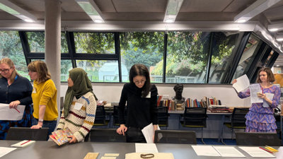 People looking at Collections during Culture& workshop