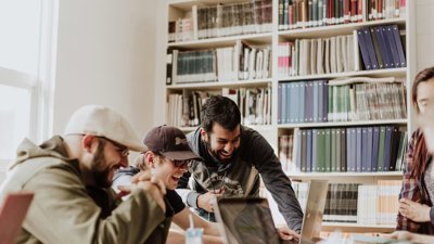 Group laughing during discussion. 