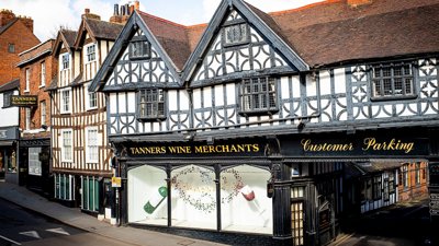 Old Tudor-style shop front on high street.