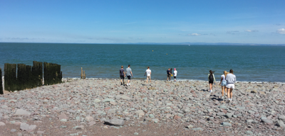 Pupils from 2022 Frederick Soddy Schools Award recipient Blenheim High School undertaking fieldwork on a beach to investigate the impact of coastal processes in Porlock Bay, Somerset