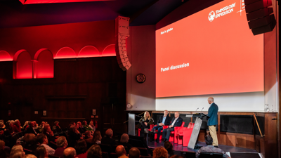 Speakers on stage in the Ondaatje Theatre during a panel discussion as part of the Transglobe Expedition Trust event at the Society