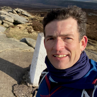 Clive Sanders in a mountainous area.