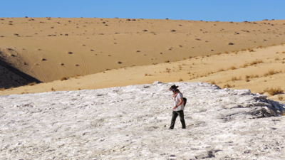 Paul walking through Nefud Sand Sea
