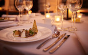 A close-up shot of a dinner table on a formal dinner table. 