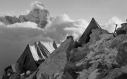 Old black and white photograph of rocky camp near Ama Dablam.