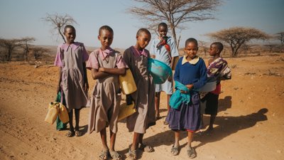 A group of African children on their way to collect water